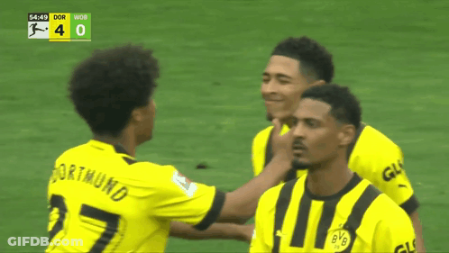 A Soccer Player With The Name Dortmund On The Back Of Their Jersey GIF