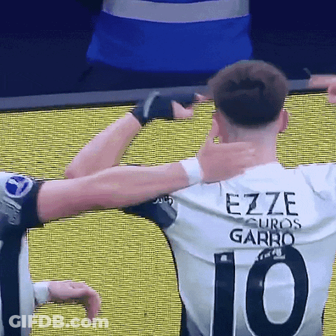 A Soccer Player With The Name Ezze On His Back GIF