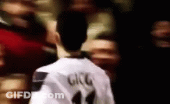 A Soccer Player With The Name Gigg On The Back Of His Shirt GIF