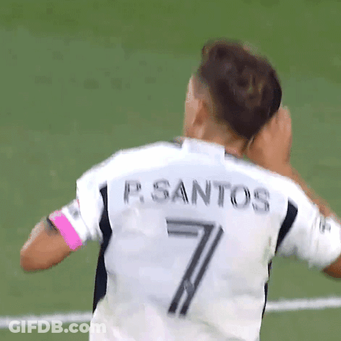 A Soccer Player With The Name P. Santos On His Shirt GIF