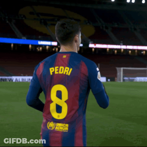 A Soccer Player With The Name Pedri On The Back Of His Shirt GIF