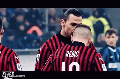 A Soccer Player With The Name Rebic On The Back Of His Shirt GIF