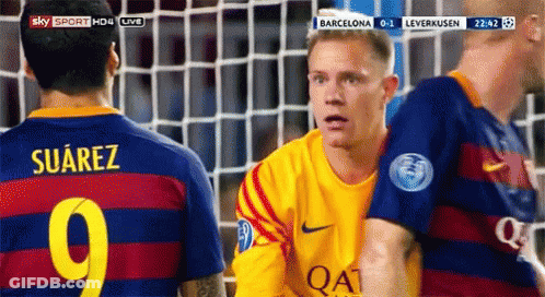 A Soccer Player With The Name Suarez On The Back Of His Shirt GIF