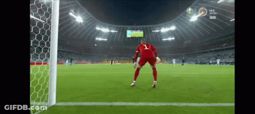 A Soccer Player With The Number 1 On His Jersey Stands On The Field GIF