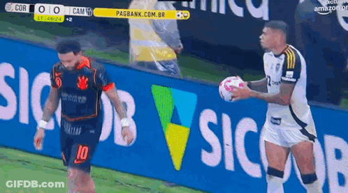 A Soccer Player With The Number 10 On His Jersey Holds A Ball GIF