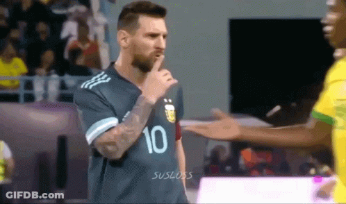 A Soccer Player With The Number 10 On His Jersey Holds His Finger To His Mouth GIF