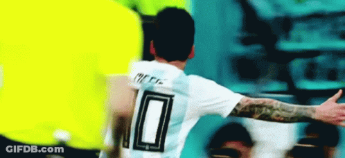 A Soccer Player With The Number 10 On His Jersey Is Celebrating A Goal . GIF