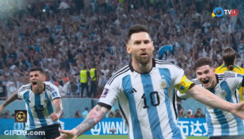 A Soccer Player With The Number 10 On His Jersey Is Celebrating GIF