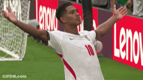 A Soccer Player With The Number 10 On His Jersey Is Celebrating GIF