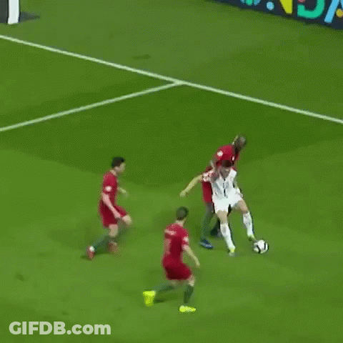 A Soccer Player With The Number 10 On His Jersey Is Kicking A Ball GIF