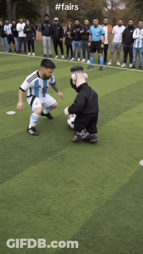 A Soccer Player With The Number 10 On His Jersey Is Kicking A Soccer Ball GIF