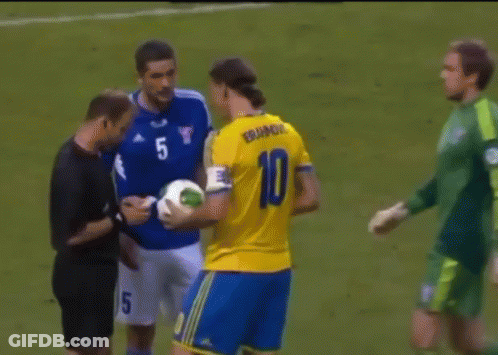 A Soccer Player With The Number 10 On His Jersey Talks To Another Player GIF