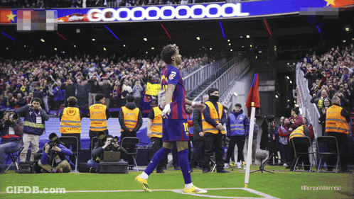 A Soccer Player With The Number 10 On His Jersey Walks Off The Field GIF