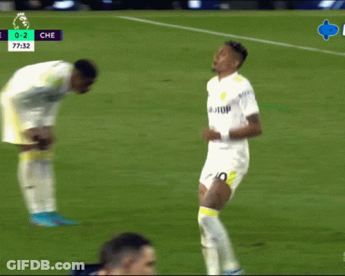 A Soccer Player With The Number 10 On His Shorts Is Running On A Field GIF
