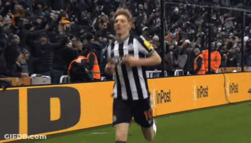 A Soccer Player With The Number 10 On His Shorts Is Running On A Field GIF