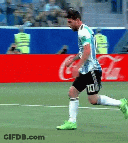 A Soccer Player With The Number 10 On His Shorts Is Running On The Field . GIF