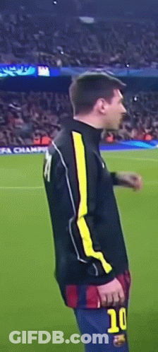A Soccer Player With The Number 10 On His Shorts Is Standing On The Field GIF