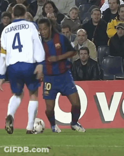 A Soccer Player With The Number 10 On His Shorts Kicks The Ball GIF