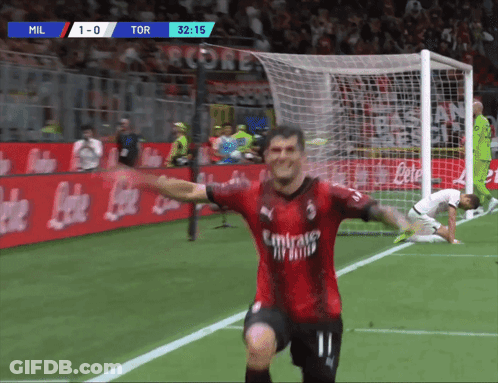 A Soccer Player With The Number 11 On His Jersey Is Celebrating A Goal GIF