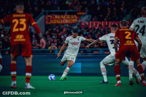 A Soccer Player With The Number 11 On His Jersey Kicks A Ball GIF