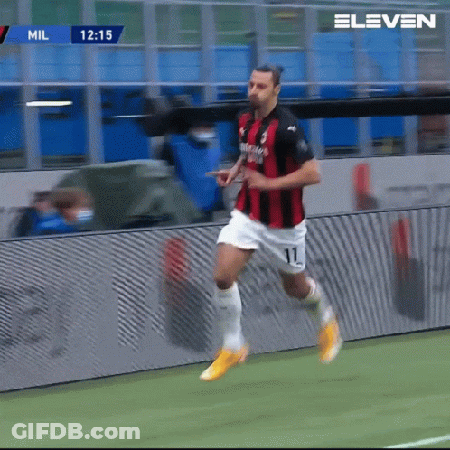 A Soccer Player With The Number 11 On His Shorts Is Running On The Field GIF