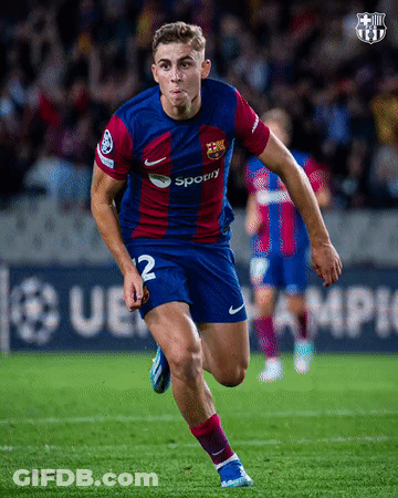 A Soccer Player With The Number 12 On His Jersey Is Running On The Field GIF