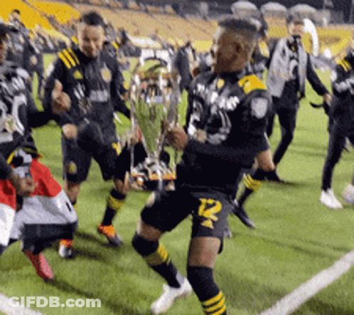 A Soccer Player With The Number 12 On His Shorts GIF