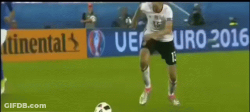 A Soccer Player With The Number 13 On His Jersey Kicks A Soccer Ball GIF