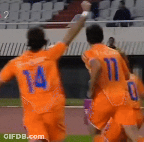 A Soccer Player With The Number 14 On His Back Is Celebrating GIF