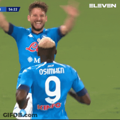 A Soccer Player With The Number 14 On His Back Is Hugging Another Player GIF