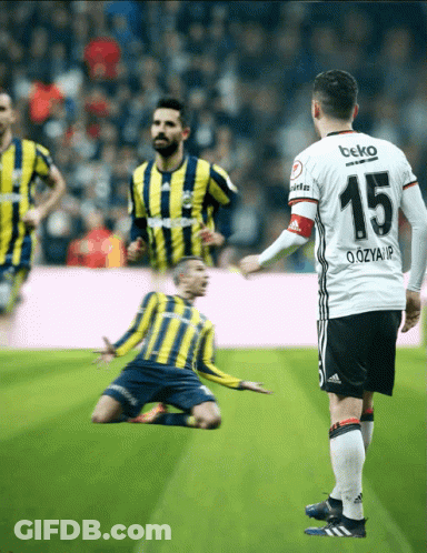 A Soccer Player With The Number 15 On His Jersey Stands On The Field GIF