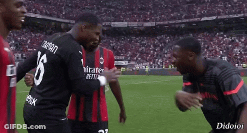 A Soccer Player With The Number 16 On His Back Is Hugging Another Player GIF