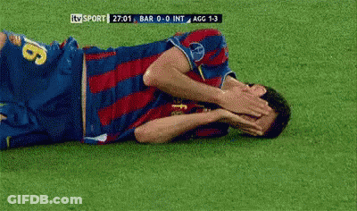 A Soccer Player With The Number 16 On His Jersey Is Laying On The Field Covering His Face GIF