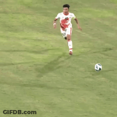 A Soccer Player With The Number 16 On His Jersey Kicks The Ball GIF