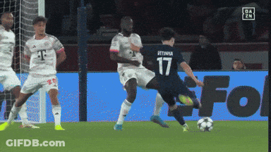 A Soccer Player With The Number 17 On His Jersey Is Kicking The Ball GIF
