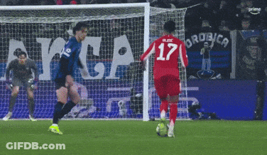 A Soccer Player With The Number 17 On His Jersey Is Kicking The Ball GIF