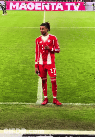 A Soccer Player With The Number 17 On His Jersey Stands On The Field GIF