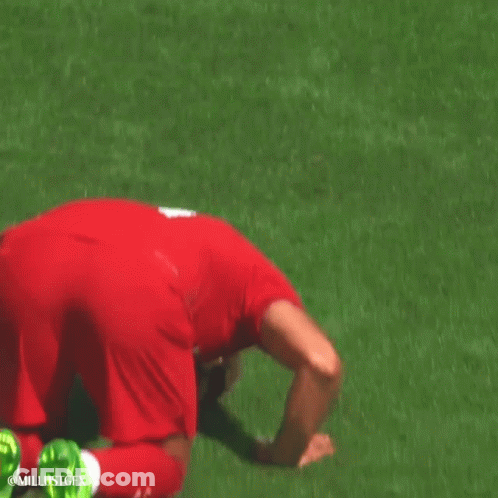 A Soccer Player With The Number 18 On His Shirt Is Talking To Another Player GIF