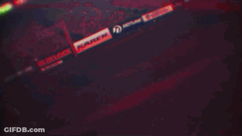 A Soccer Player With The Number 2 On His Jersey Is Kicking A Soccer Ball GIF