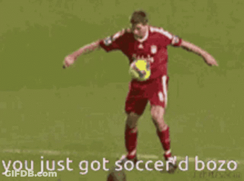 A Soccer Player With The Number 20 On His Back Is Kicking Another Player GIF