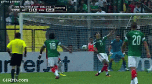A Soccer Player With The Number 20 On His Back Kicks A Ball GIF