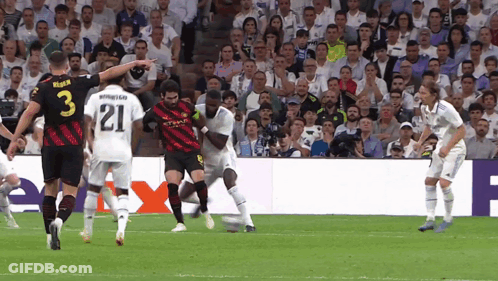 A Soccer Player With The Number 21 On His Back GIF