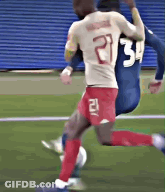 A Soccer Player With The Number 21 On The Back Of His Shirt GIF