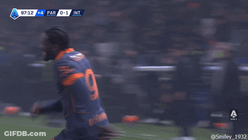 A Soccer Player With The Number 23 On His Back Is Hugging Another Soccer Player GIF