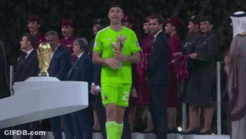 A Soccer Player With The Number 23 On His Jersey Holds A Trophy GIF