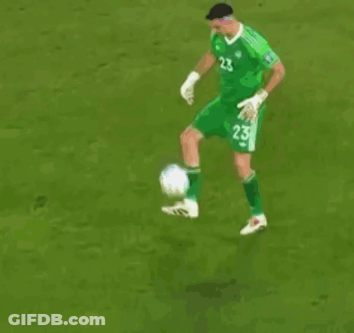 A Soccer Player With The Number 23 On His Jersey Is Kicking A Ball GIF