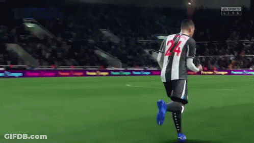 A Soccer Player With The Number 24 On His Back Is Running On A Field GIF
