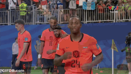 A Soccer Player With The Number 24 On His Jersey Is Running On The Field GIF