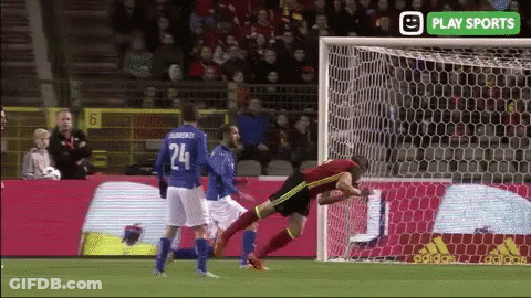 A Soccer Player With The Number 24 On His Jersey Jumps Towards The Goal GIF