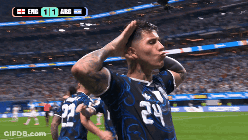 A Soccer Player With The Number 24 On His Jersey Stands On The Field GIF